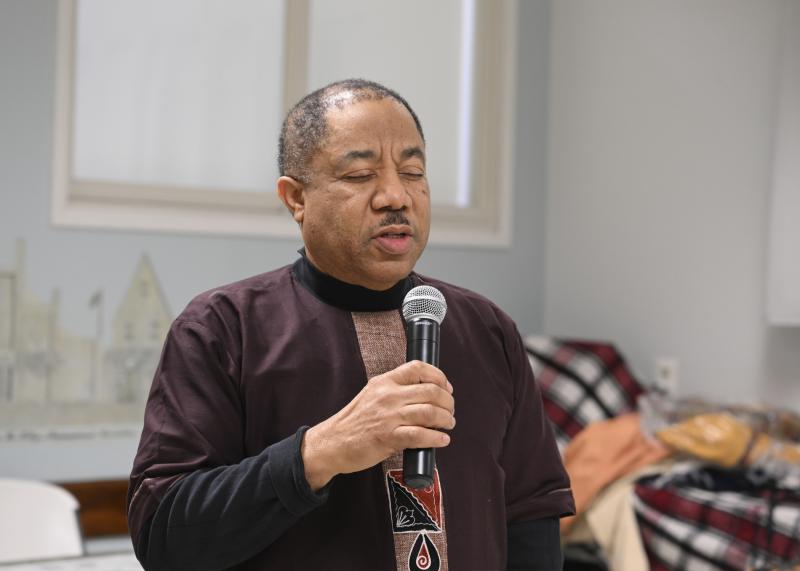 Pastor Vincent Hinds of Crossroad Community Church leads everyone in a prayer.